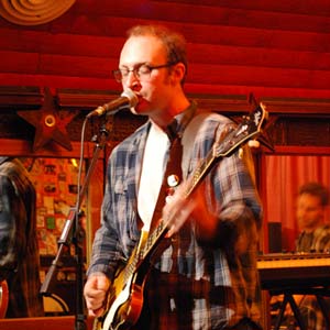 Man playing electric bass guitar